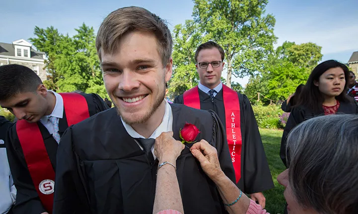 student in rose garden