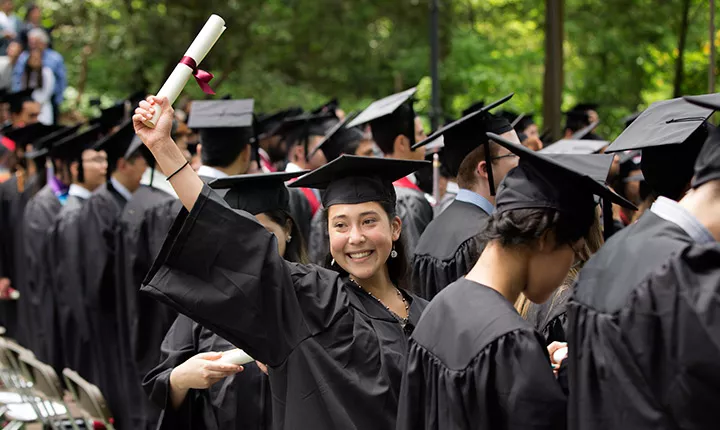 graduate with diploma